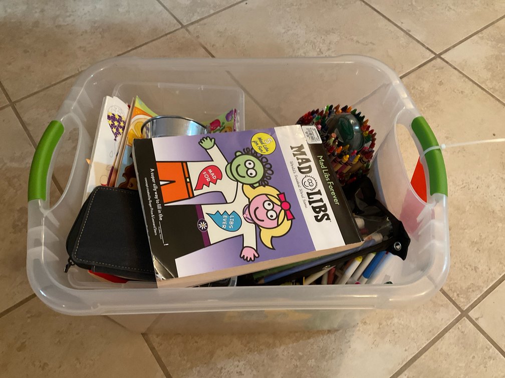 Grouping of art & activity supplies with storage bins - Basement Living & Bar Area
