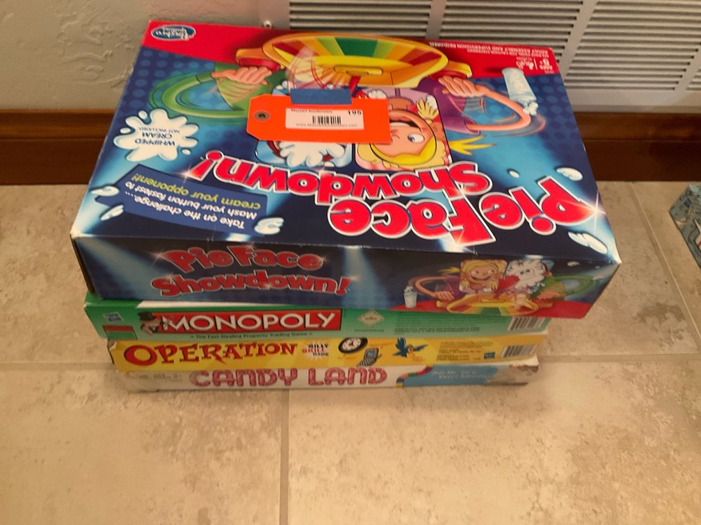 Grouping of 4 board games including Monopoly & Operation - Basement Living & Bar Area