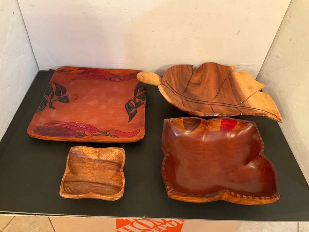 Grouping of carved wooden bowls & trays - Basement Living & Bar Area