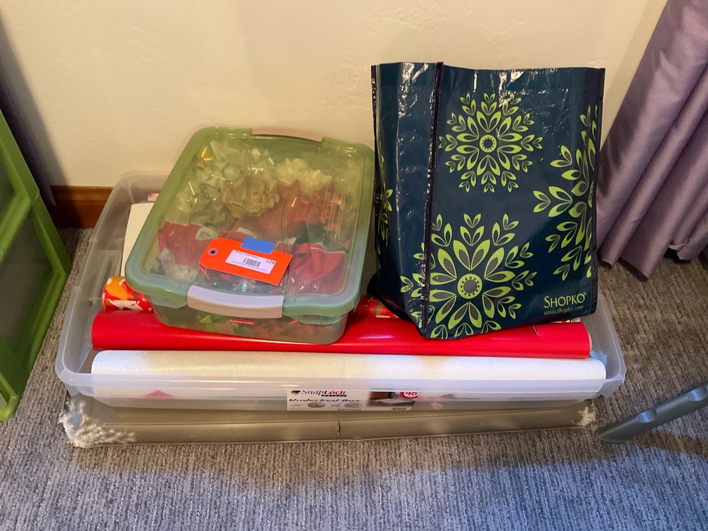 Gift wrapping supplies with storage containers & tote - Basement Bedroom
