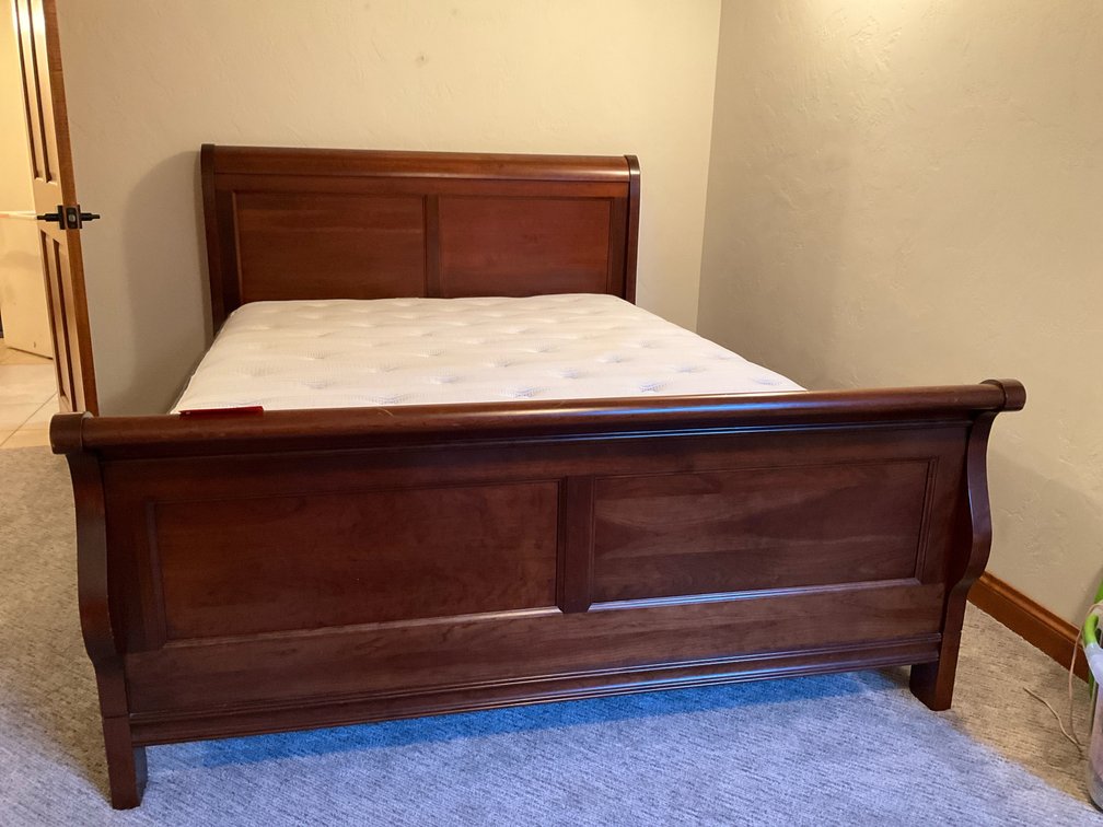 Wood sleigh bed frame with Beautyrest mattress 60” x 80” - Basement Bedroom
