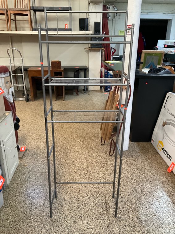Gray metal over-the-toilet shelving rack