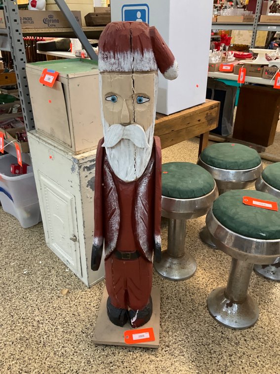 Carved painted wood Santa Claus figure on base
