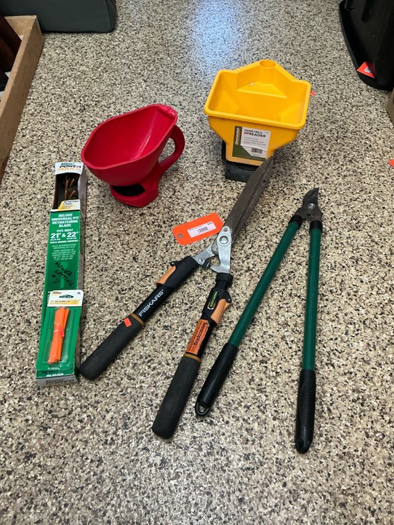 Grouping of lawn & garden tools with spreaders & shears