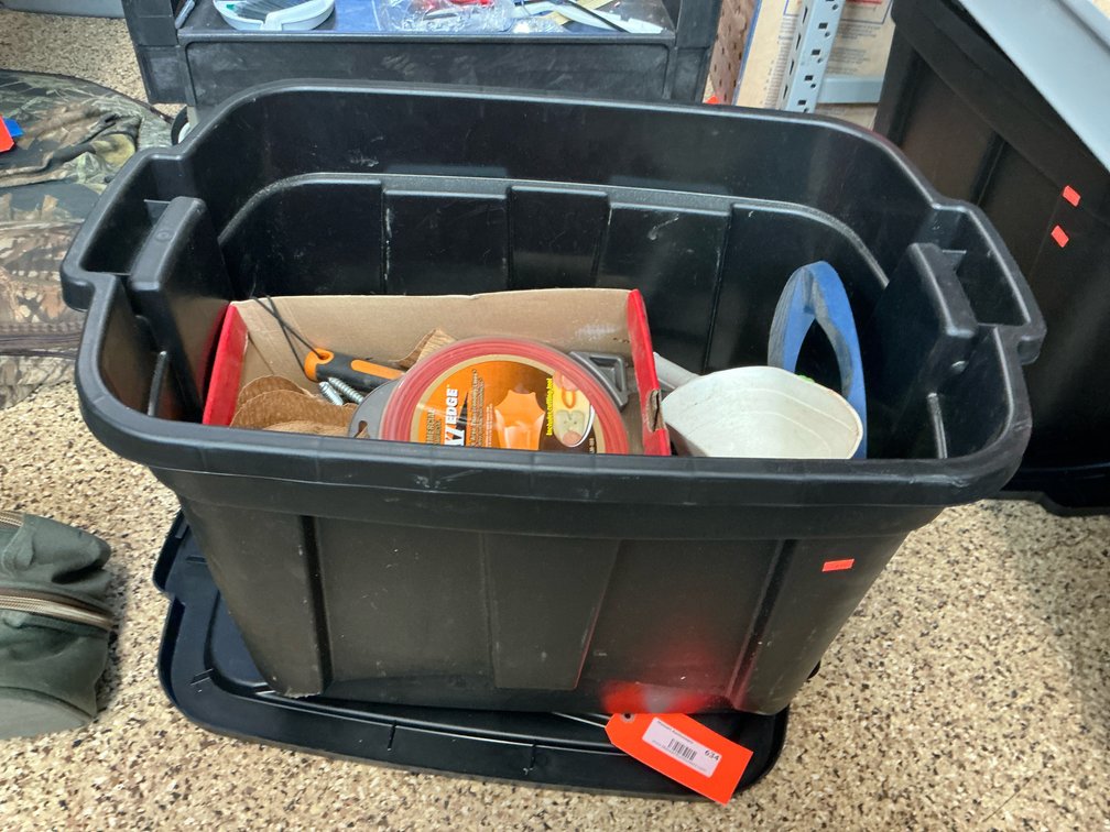Black utility tote with lawn, paint & workshop supplies