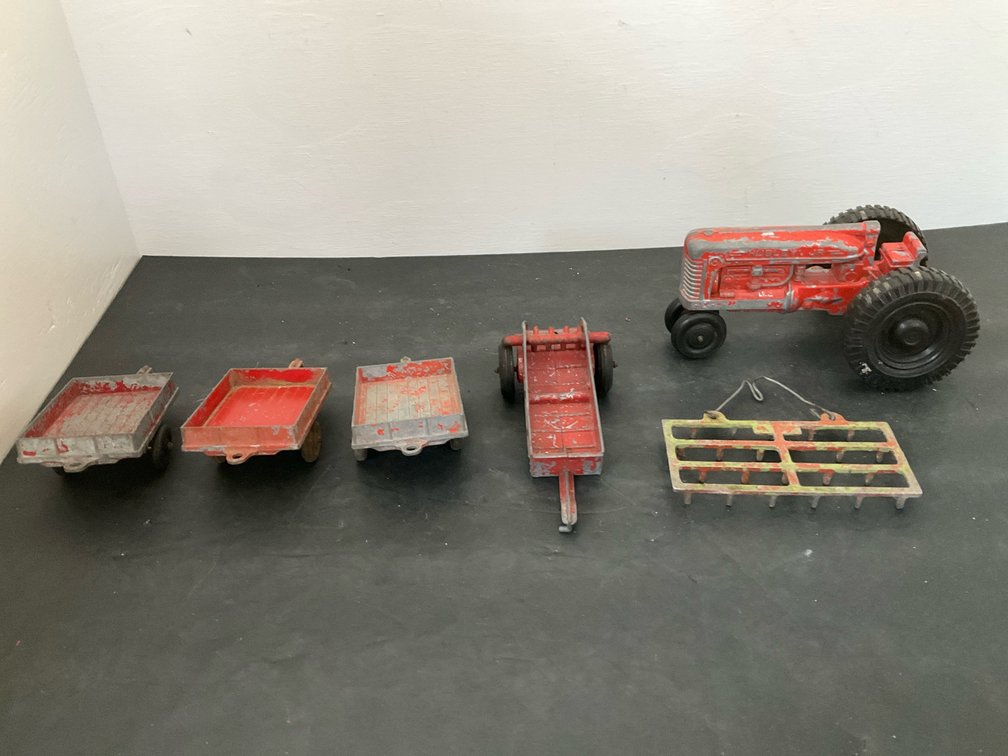 Hubley Jr. cast metal tractor with wagons & implements