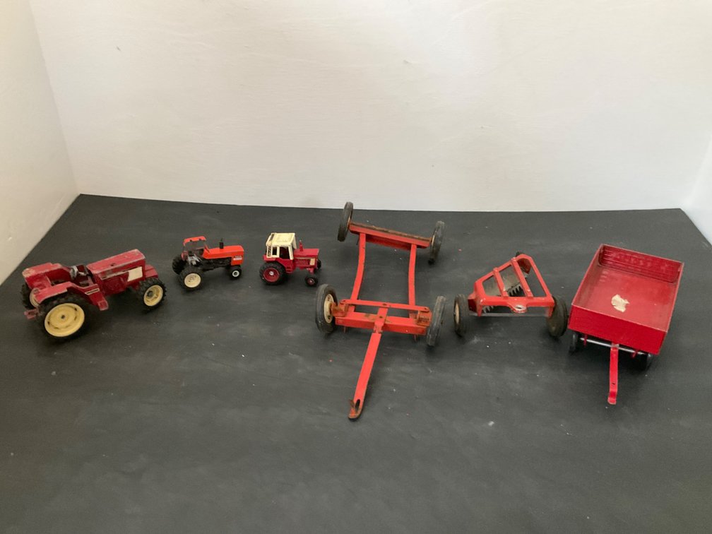Die-cast toy tractors & farm implements