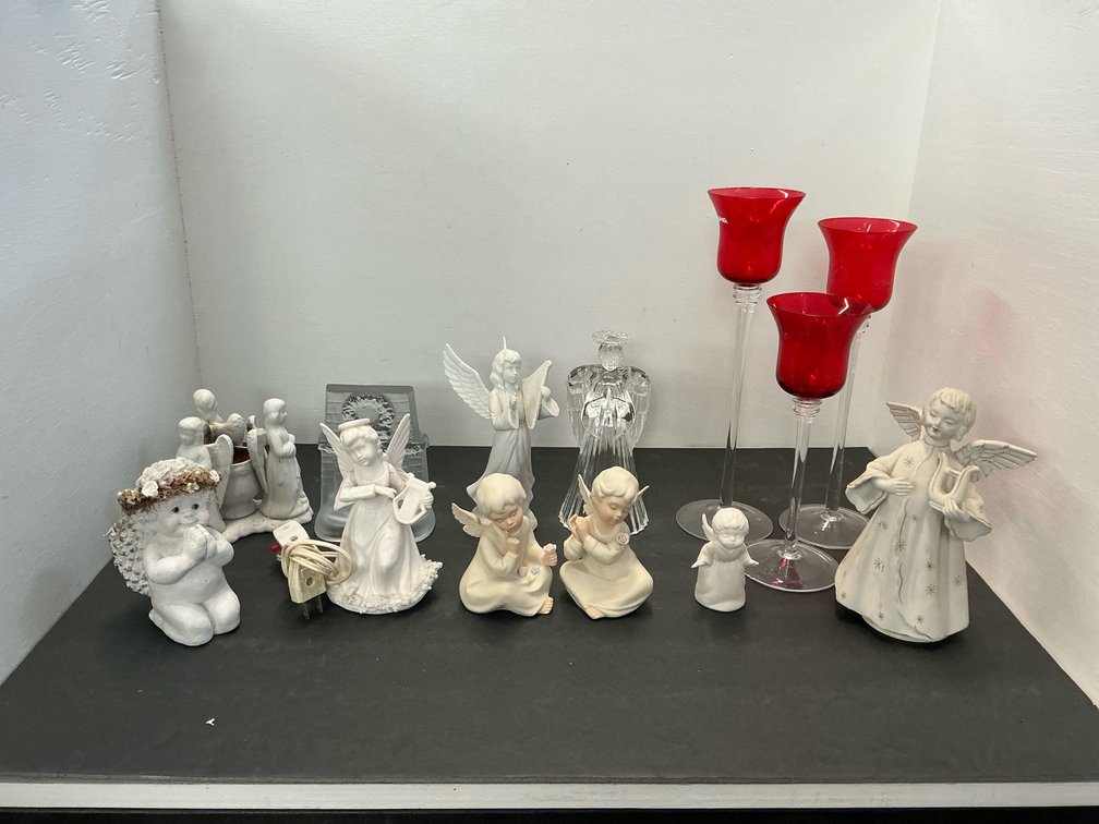 Group of angel figurines & 3 red glass candleholders