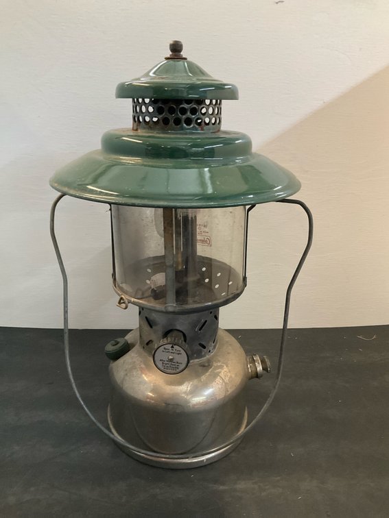 Coleman lantern with green ventilator & nickel fount