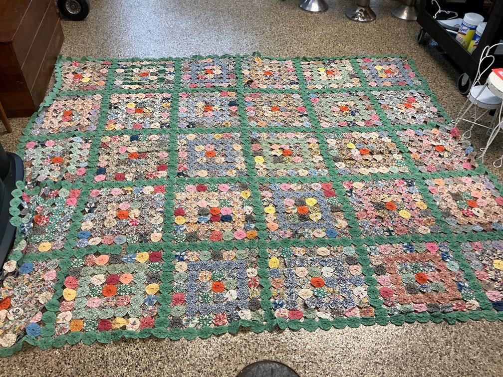 Handmade fabric yo-yo quilt