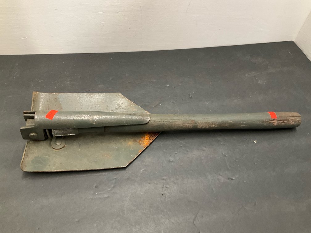 Green folding entrenching tool with wooden handle