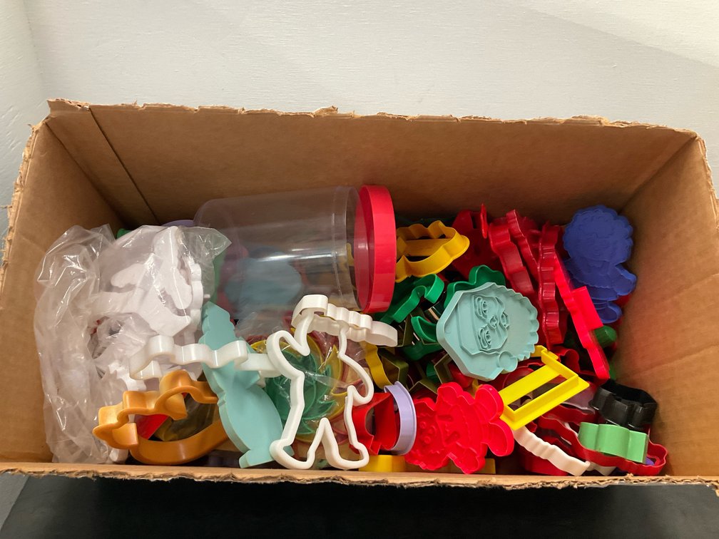Assorted plastic & metal cookie cutters