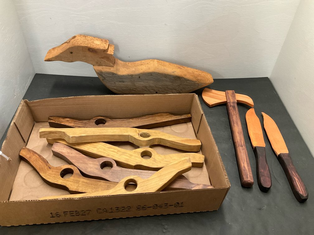 Wooden duck decoy, toy hatchet, knives & bottle holders