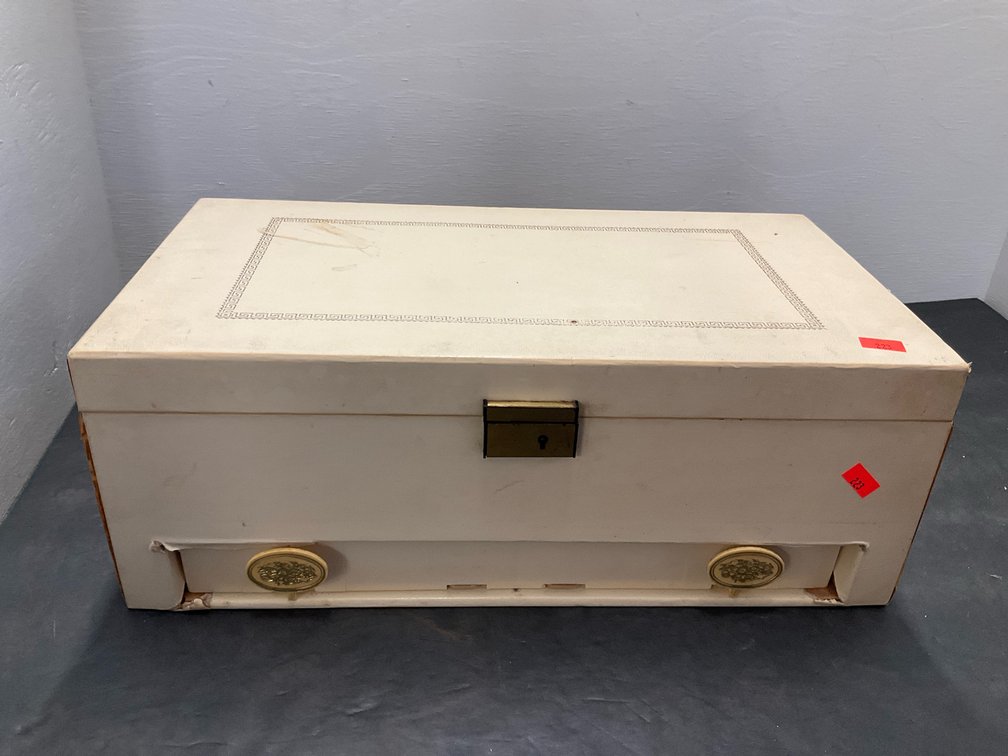 Cream jewelry chest with costume jewelry contents