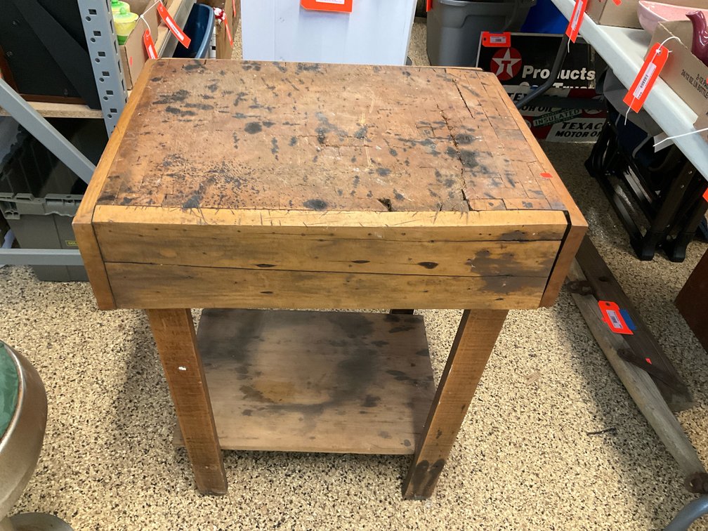 Wooden butcher block table with lower shelf
