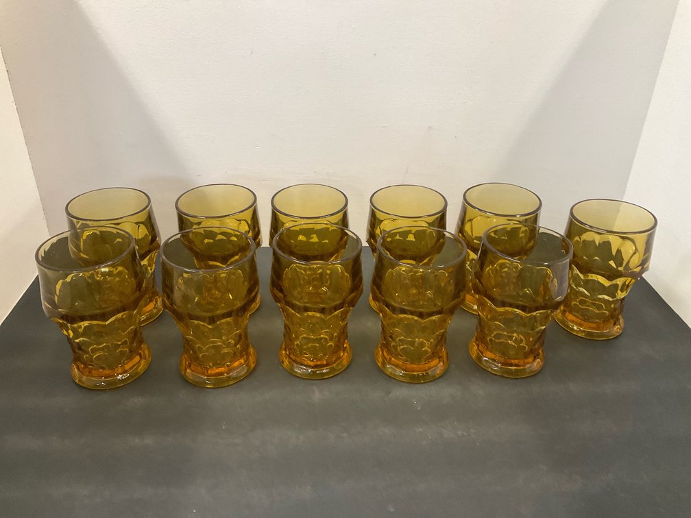 Grouping of amber pressed glass tumblers