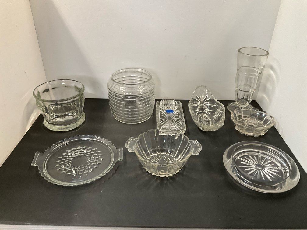 Grouping of clear pressed glass tableware pieces