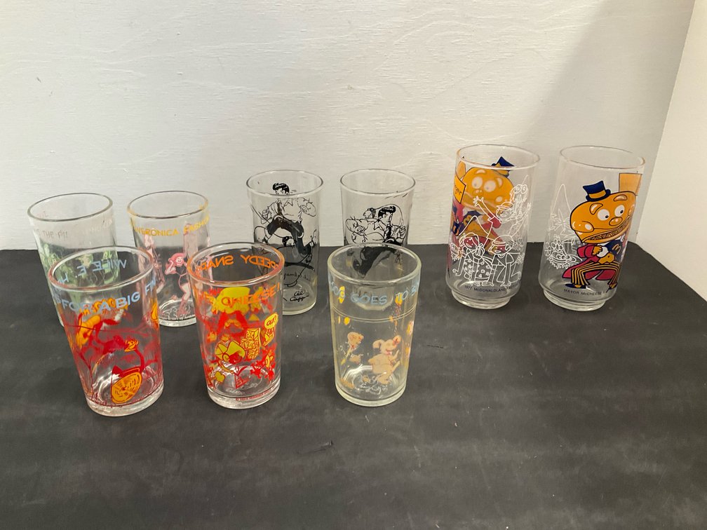 Group of cartoon character drinking glasses