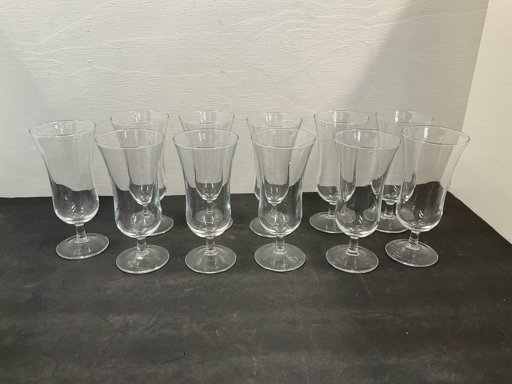 Clear footed glasses, amber & aqua tumblers