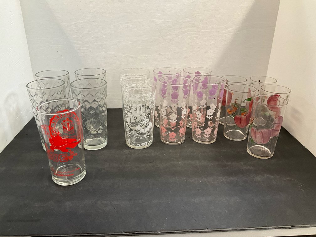 assorted glass tumblers with floral & molded designs