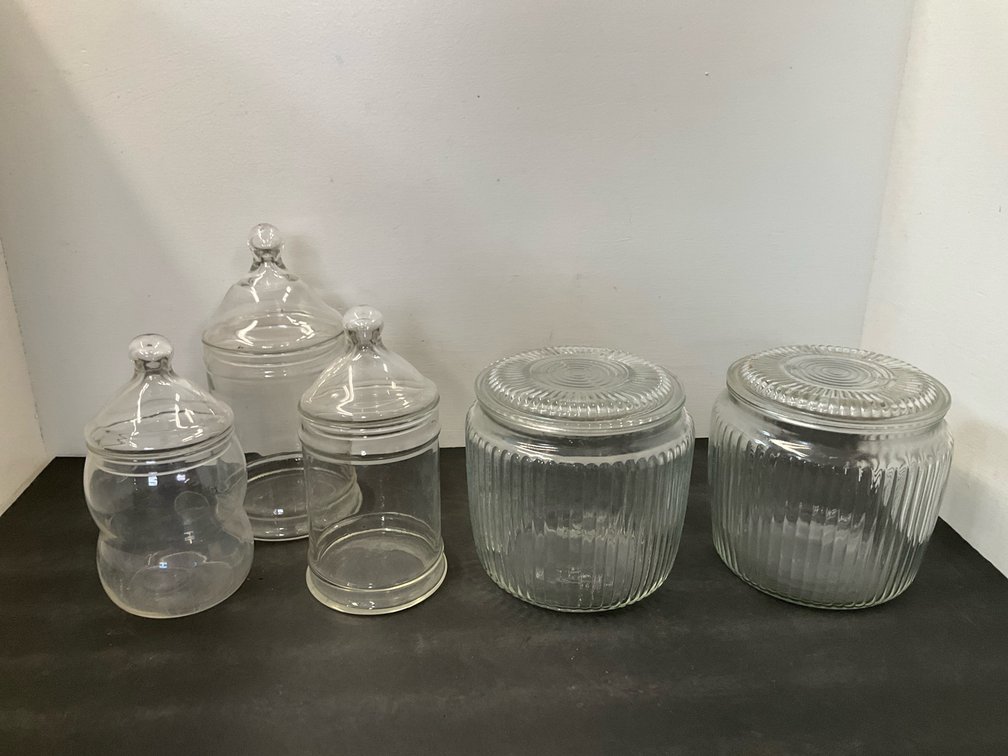 Group of clear glass apothecary & ribbed canister jars with lids