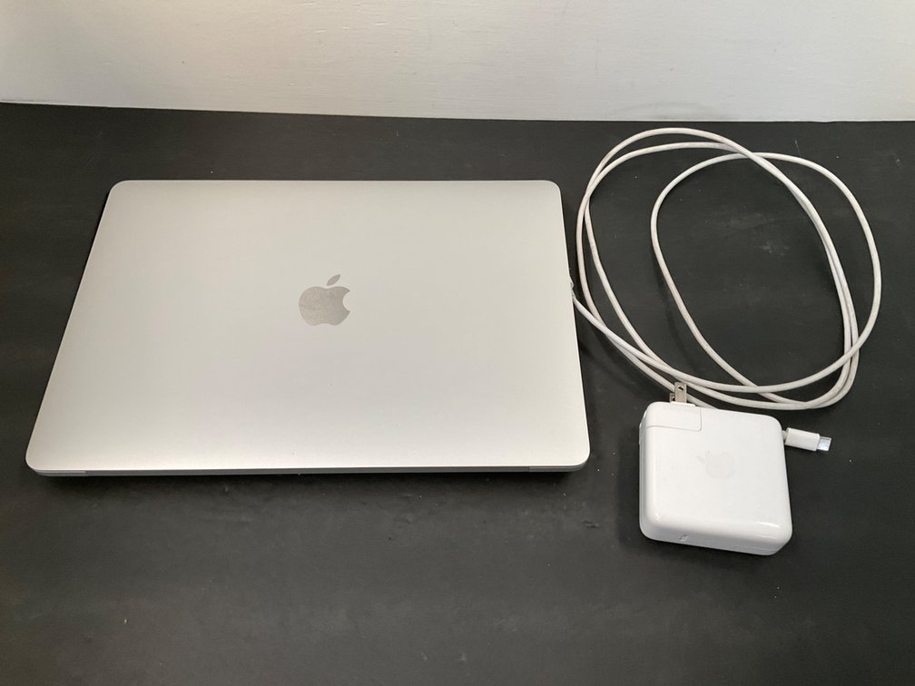 Apple MacBook Pro laptop with power adapter & cable