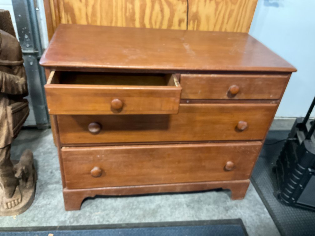 Wooden two-over-two chest of drawers