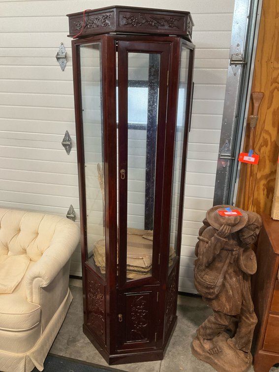 Carved dark wood hexagonal curio display cabinet