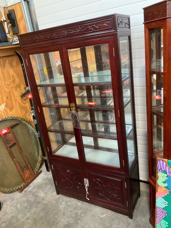 Asian-style carved wood curio display cabinet