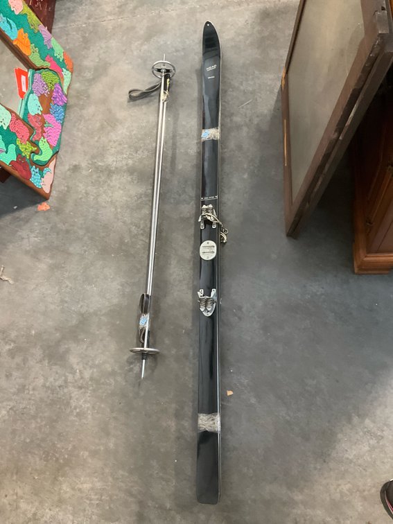 Pair of Head skis with bindings & ski poles