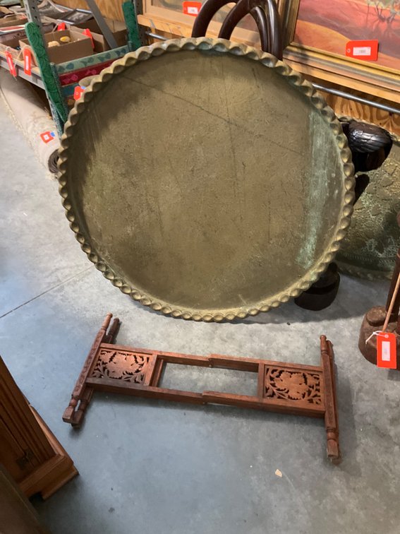 Round brass tray table with carved folding wood base