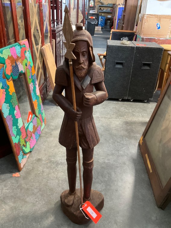 Carved wood standing knight figure with spear