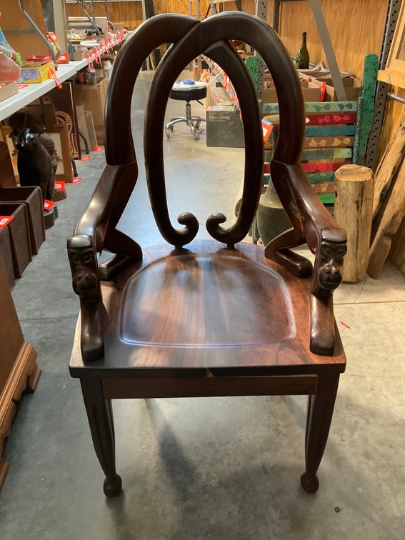 Carved hardwood monkey armchair