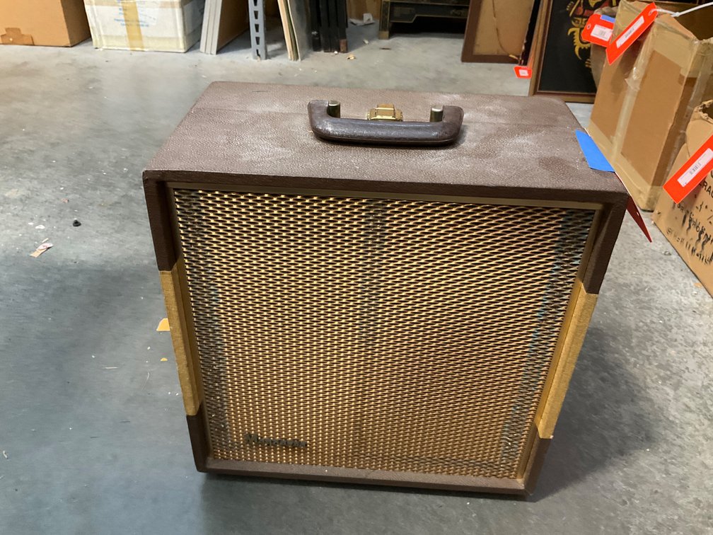 Magnavox brown portable speaker cabinet with mesh grille