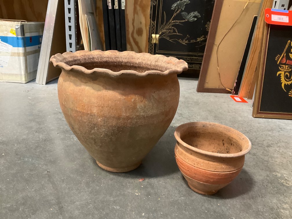 Pair of terracotta planters with painted parrot
