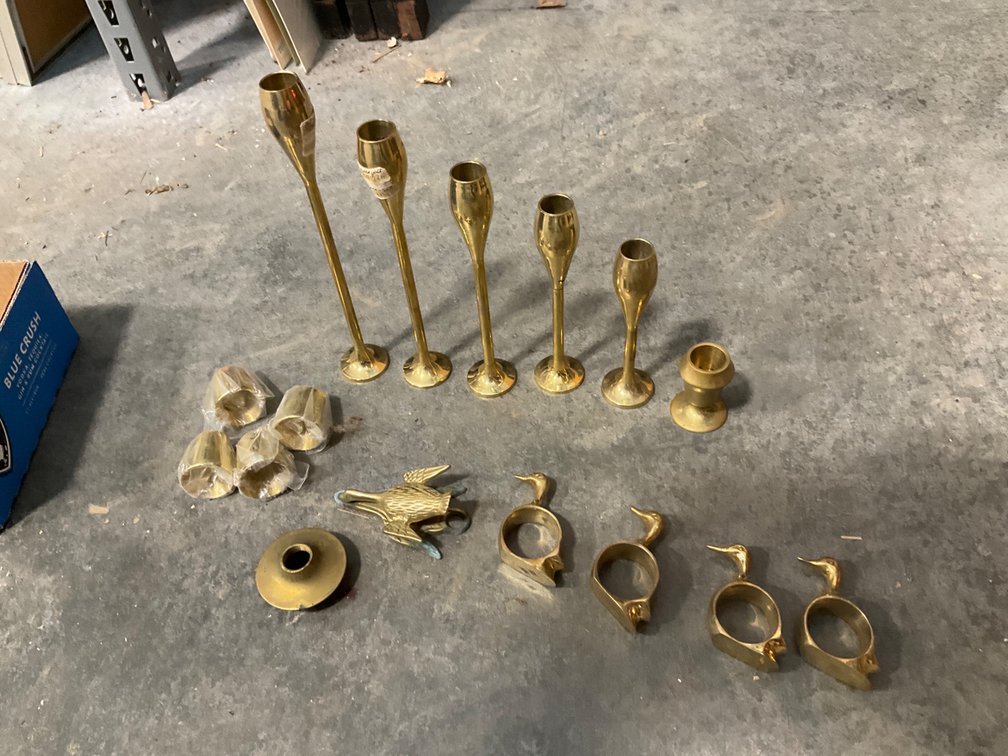 Brass tabletop decor with candleholders & duck napkin rings