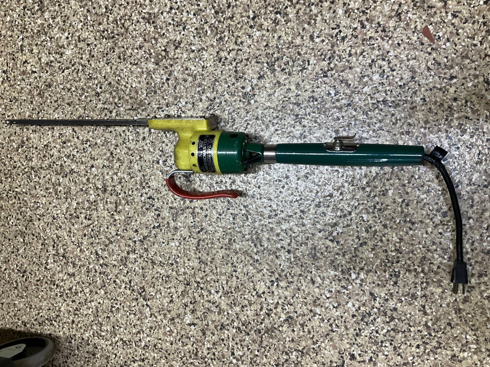 Kaufman Hedgemaster electric hedge trimmer, bag and stuffies