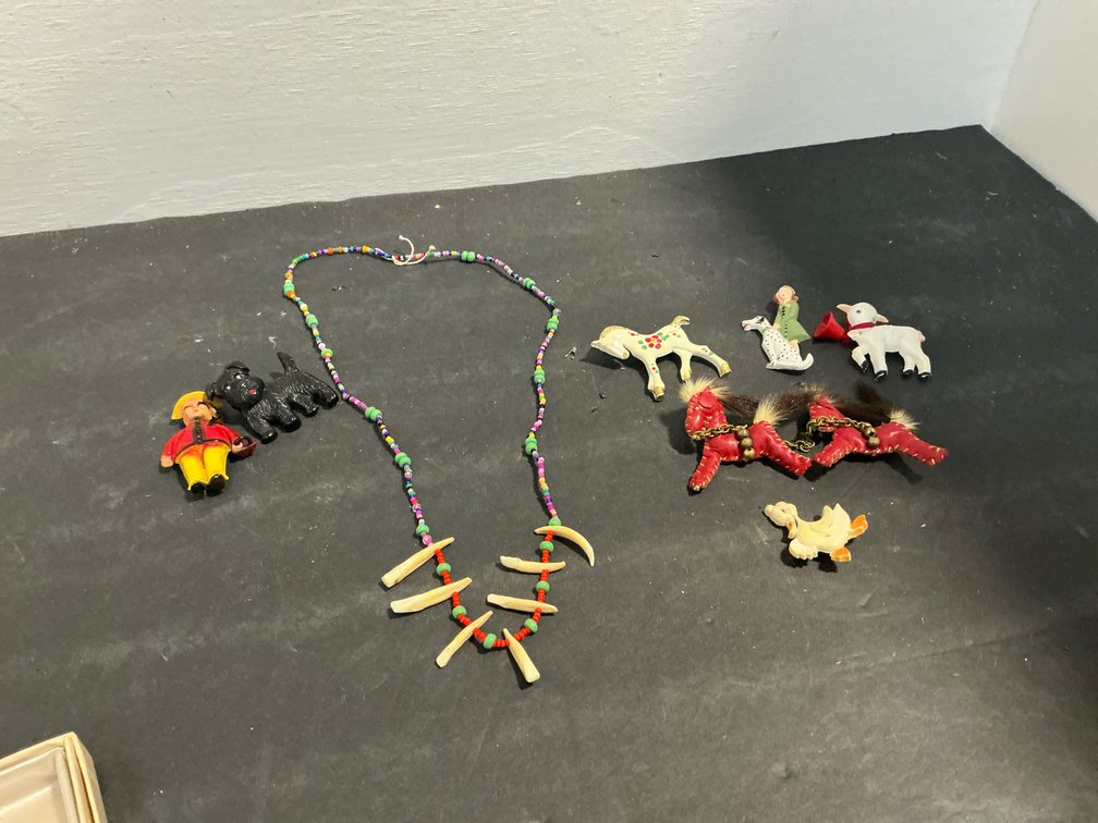 Novelty brooches, figurines & beaded necklace