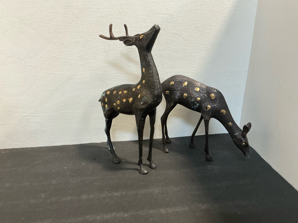 Pair of cast metal spotted deer figurines