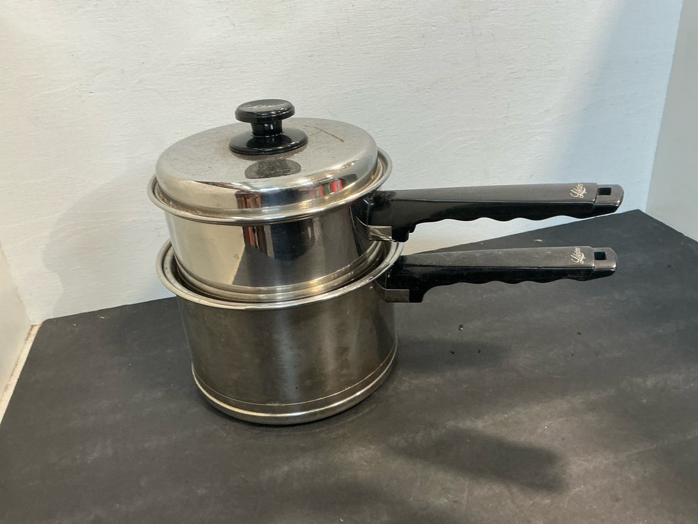Lifetime stainless steel saucepans with lids