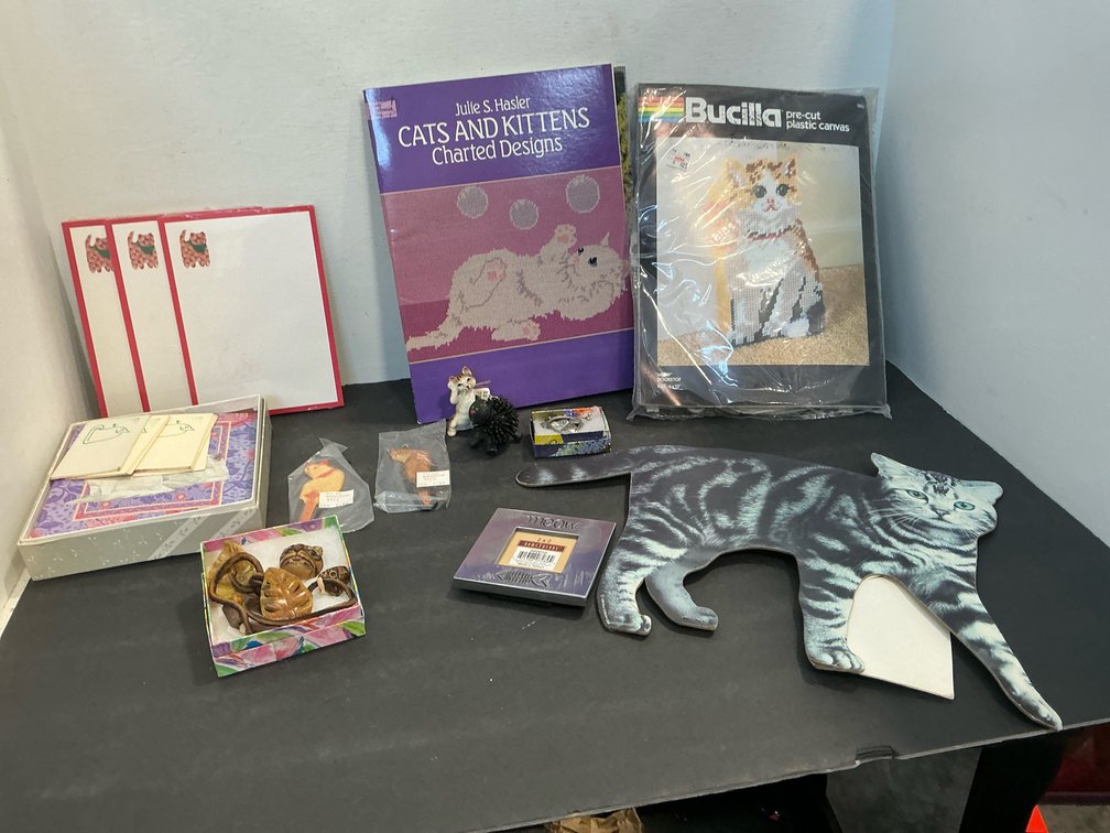 Grouping of cat-themed crafts, stationery & decor
