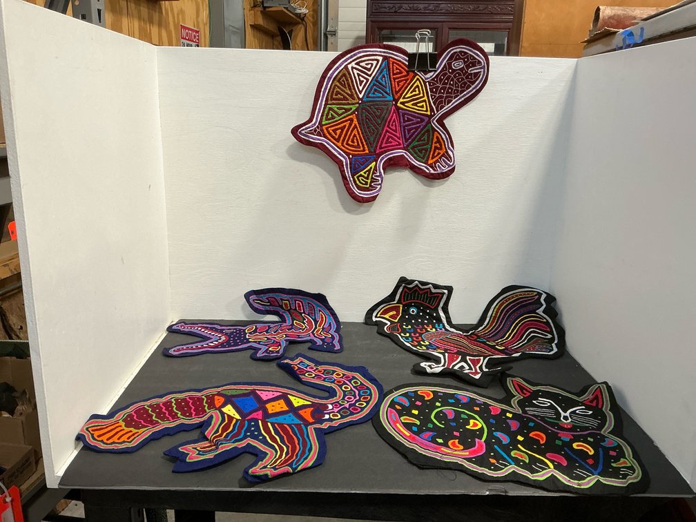 Animal-shaped mola appliqué textile panels