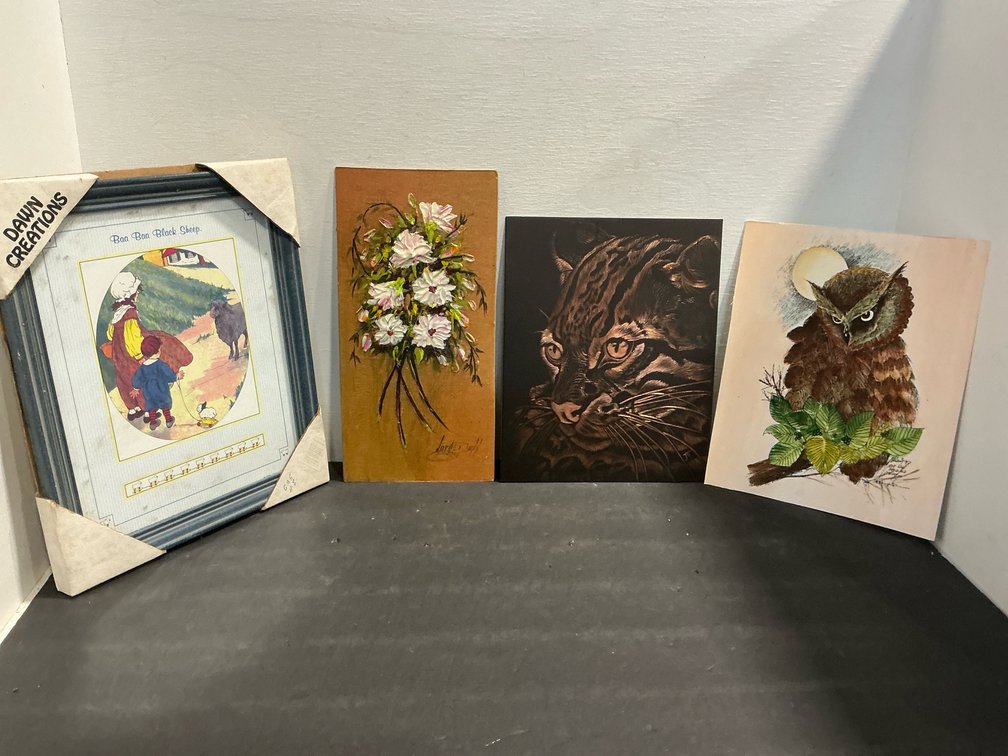 Grouping of assorted wall art pieces