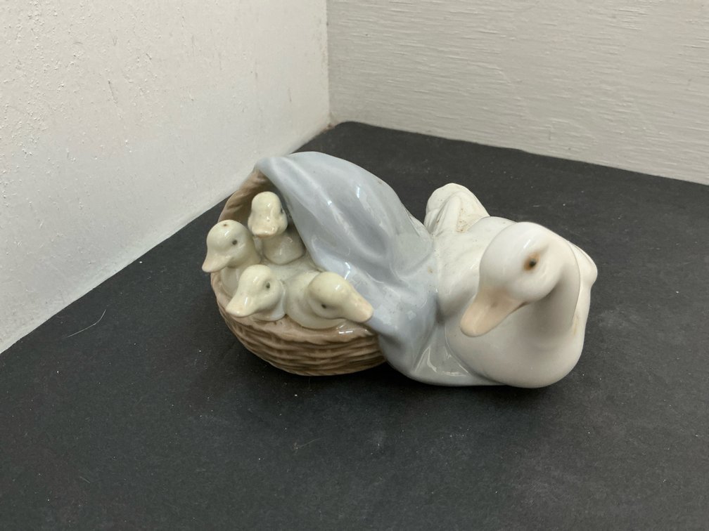 Lladró porcelain duck with ducklings in basket figurine