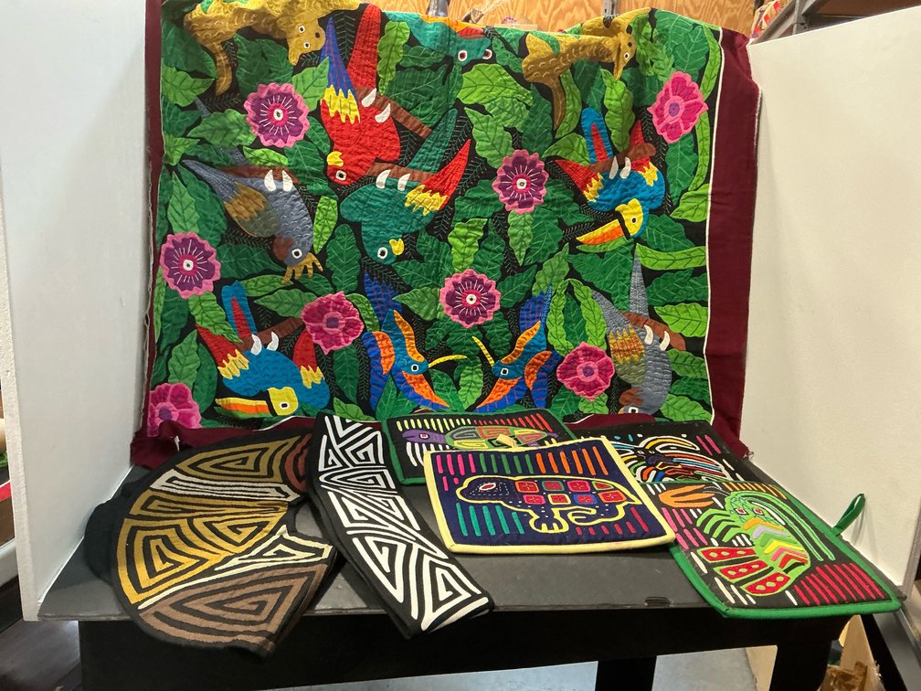 Appliqué bird wall hanging & mola textiles