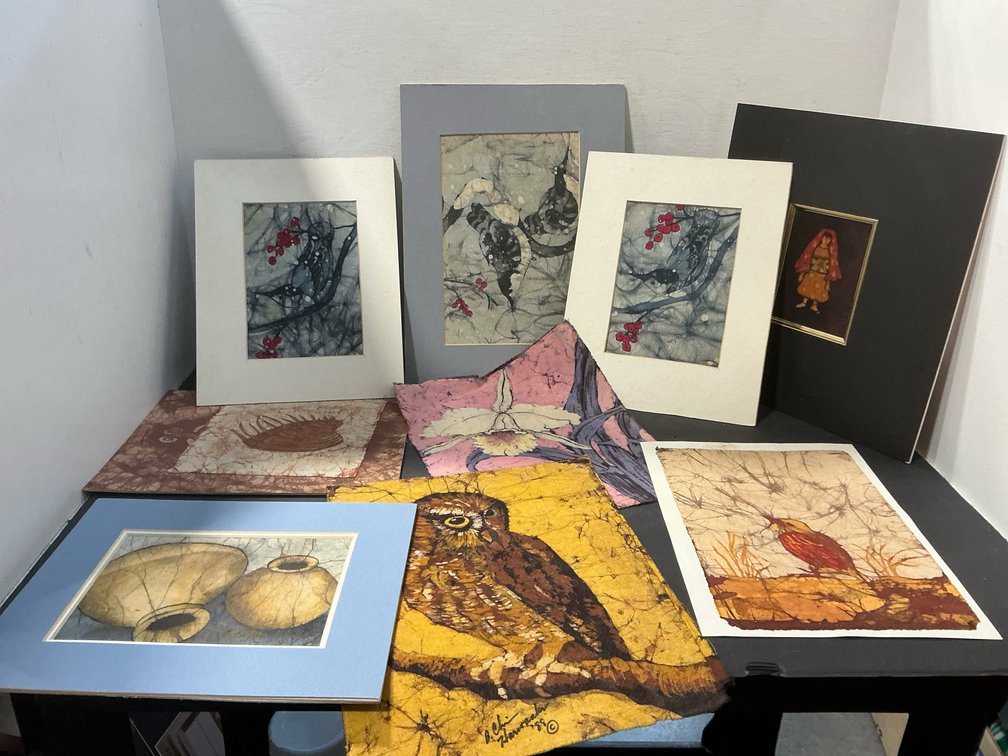 Grouping of matted and loose batik artworks