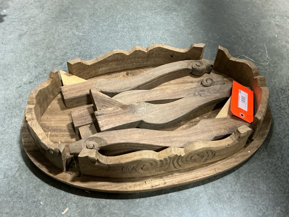 Carved dark wood circular display stand