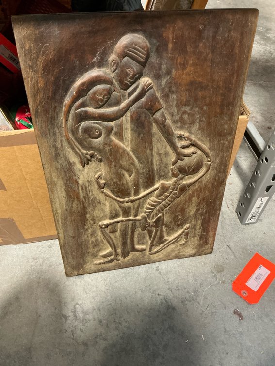 Carved wood bas-relief panel with figures & skeleton