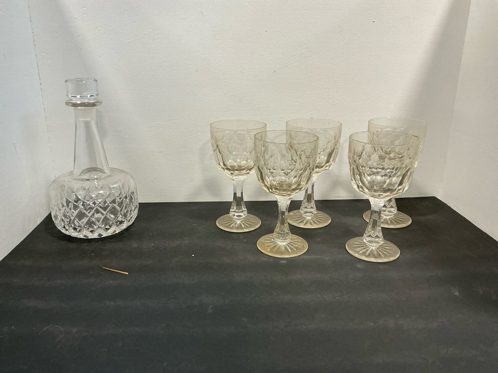 Cut crystal decanter with stopper & 5 stemmed glasses