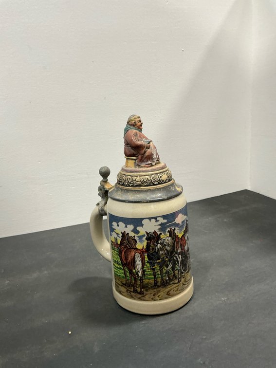 Ceramic beer stein with figural monk lid